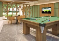 Salão de jogos com mesa de bilhar e área de estar — Mirador Playa Arenas