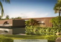 Edifício moderno com paisagismo exuberante e espelho d'água no Condomínio Raro
