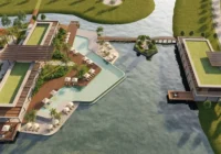 Vista aérea da área de lazer com piscina e lagos do condomínio — Condomínio Isla no Arpoador